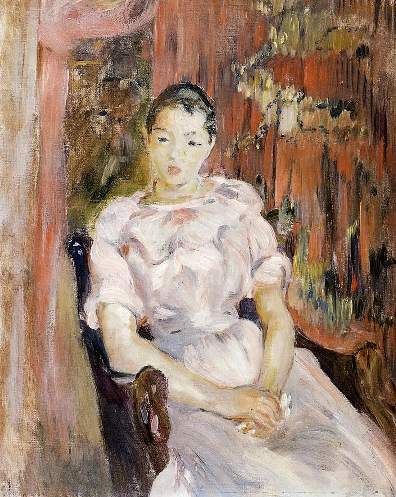 Giovane ragazza seduta
